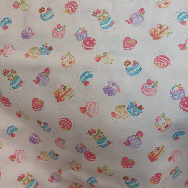 French Macrons cotton fabric by Cosmo AP35407-1A Ivory background