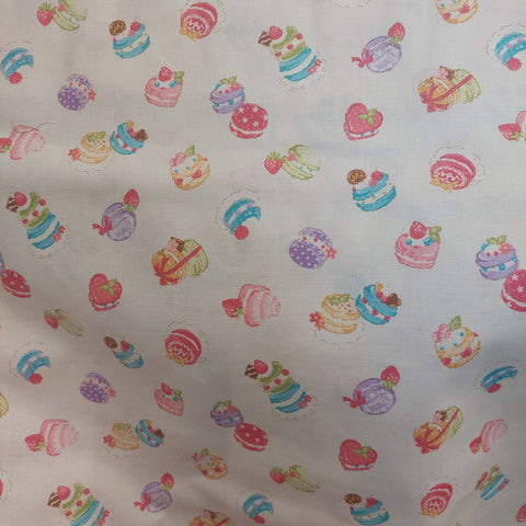 French Macrons cotton fabric by Cosmo AP35407-1A Ivory background